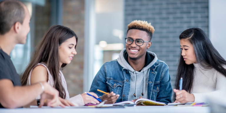 Teens studying at a library