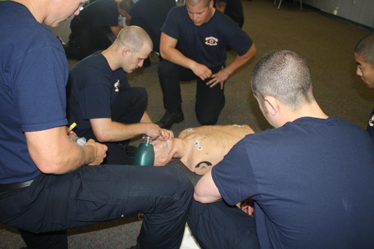 Fire fighter recruits learn how to intubate a patient