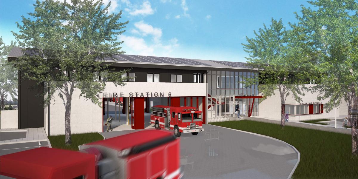 Fire trucks in front of the new Fire Station 6 on a sunny day