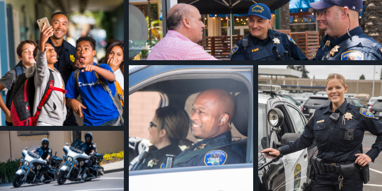 Several officers interacting with the community