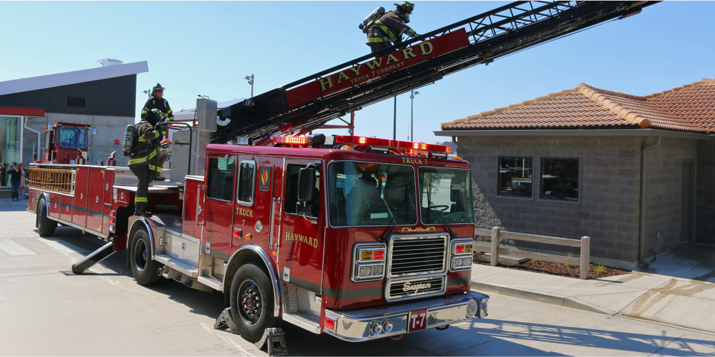 A Fire Ladder Truck with the ladder raised