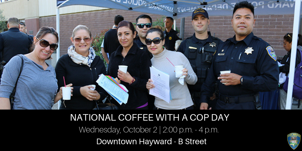 Four women having coffee with three police officers