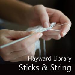 Hands holding yarn and crochet hook