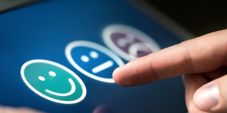 Photo of someone taking a survey about customer service.