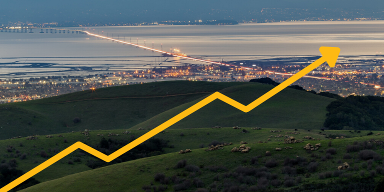 Overlooking Hayward with a yellow graph trendiing upward