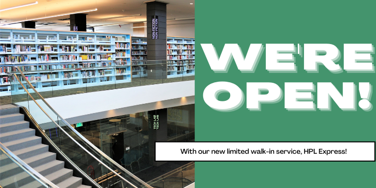 The second foloor of the Downtown Library next to the the text: We're Open