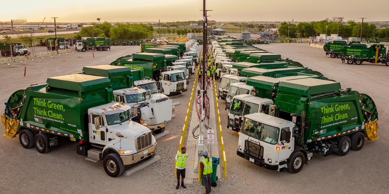 Waste Management Vehicles in a parking lot