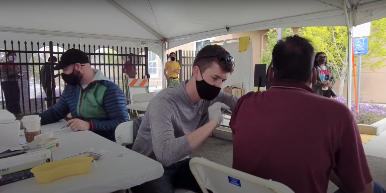 People getting vaccinated at the vaccine clinic