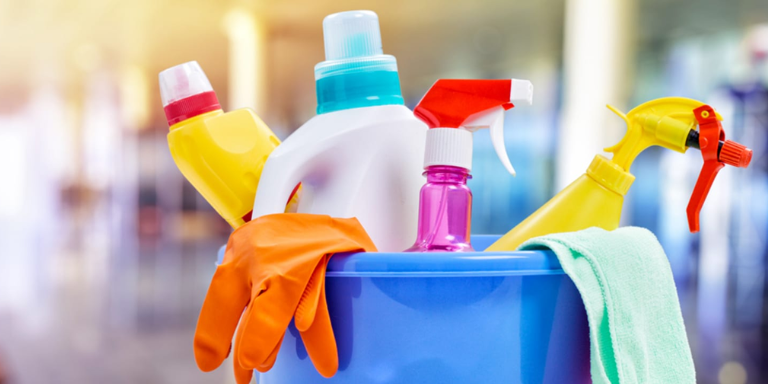 A bucket and multicolor cleaning products
