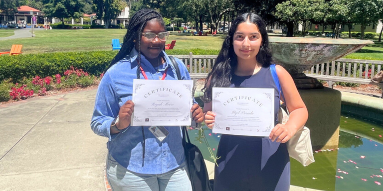 Two HUSD students holding certificates from the Eden Area ROP