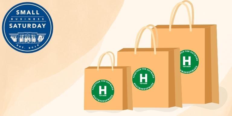 Illustration of three brown shopping bags with the Together for Hayward green logo on them. In the top left corner, the Small Business Saturday logo