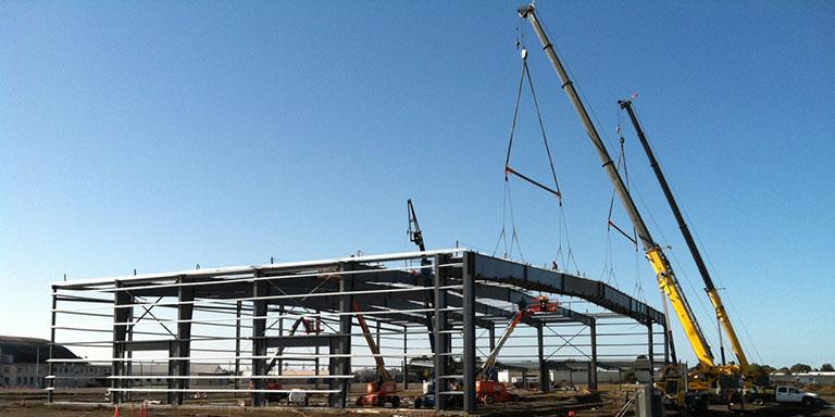 Merdian being built by a large construction crane