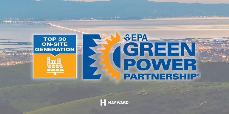 Photo of the Hayward Hills and a view of the City and San Mateo bridge at dusk. On top of it text: Top 30 On-Site Generation. EPA Green Power Partnership.