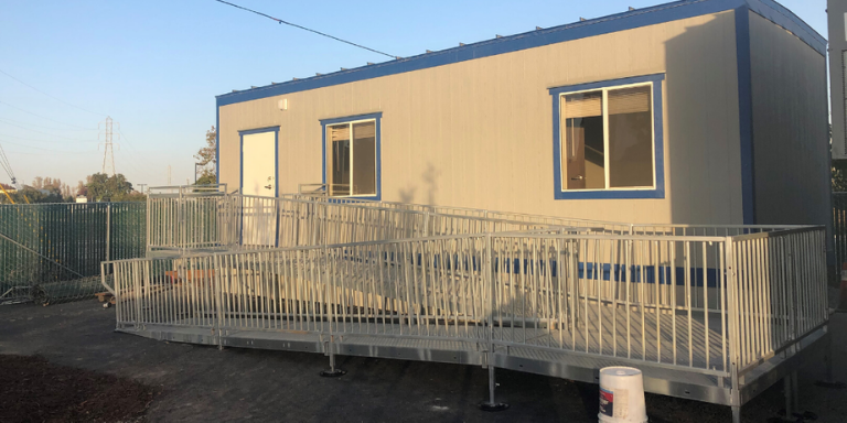Grey and blue portable building