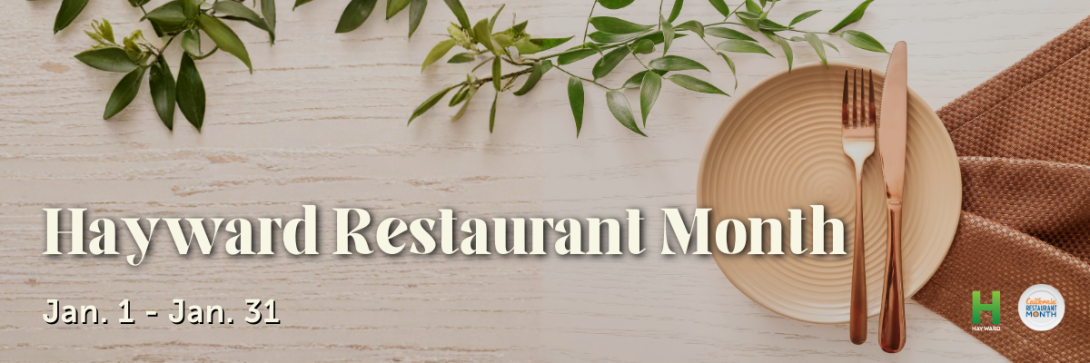 Image of a plate and with utensils on a wooden table. Text on top reads Hayward Restaurant Month Jan.