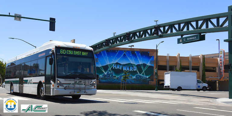 Photo of a bus in intersection in downtown Hayward.