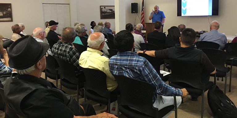 people listening to a presentation