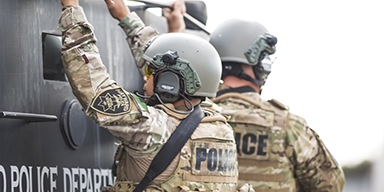 Two police officers in tactical gear